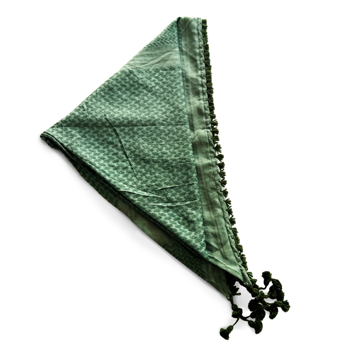Grünes Dreieckstuch mit traditionellem Webmuster und zarten Quasten – ein kraftvolles Accessoire, das Naturverbundenheit, Schutz und stilvolle Ausdruckskraft vereint. Ideal für Rituale, Waldgänge oder als bewusstes Statement-Piece.