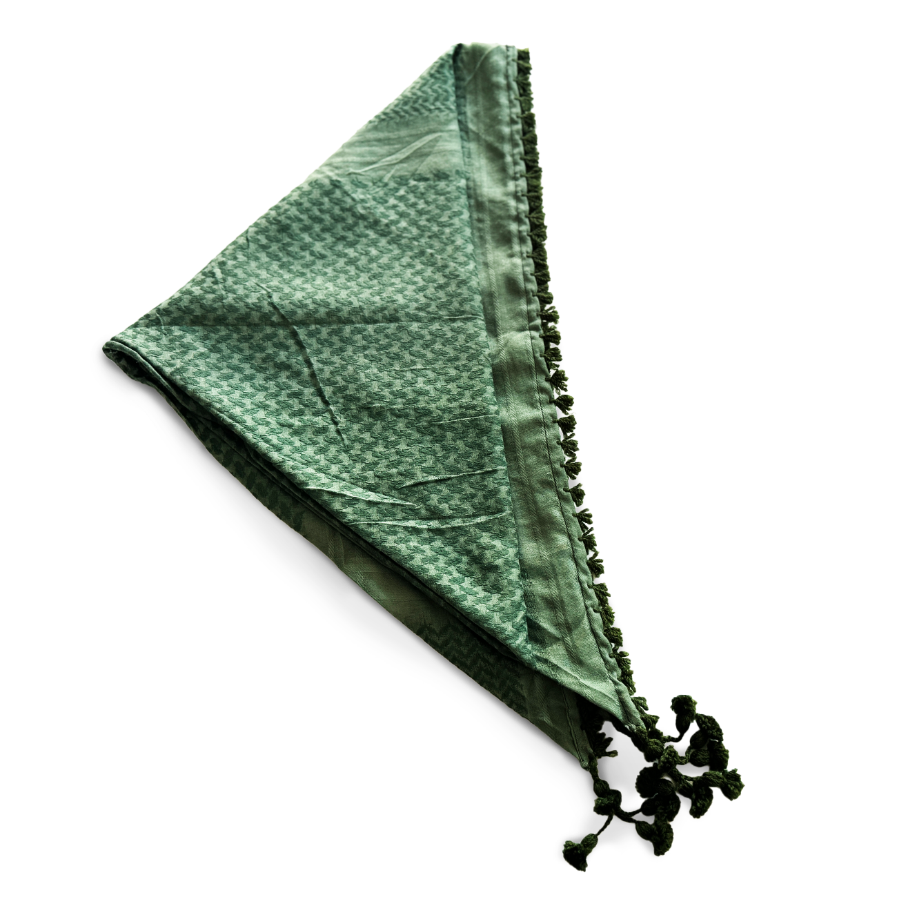 Grünes Dreieckstuch mit traditionellem Webmuster und zarten Quasten – ein kraftvolles Accessoire, das Naturverbundenheit, Schutz und stilvolle Ausdruckskraft vereint. Ideal für Rituale, Waldgänge oder als bewusstes Statement-Piece.