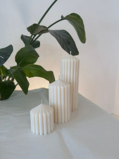 die drei verschiedenen Größen der Stumpenkerze  von der Seite abgebildet